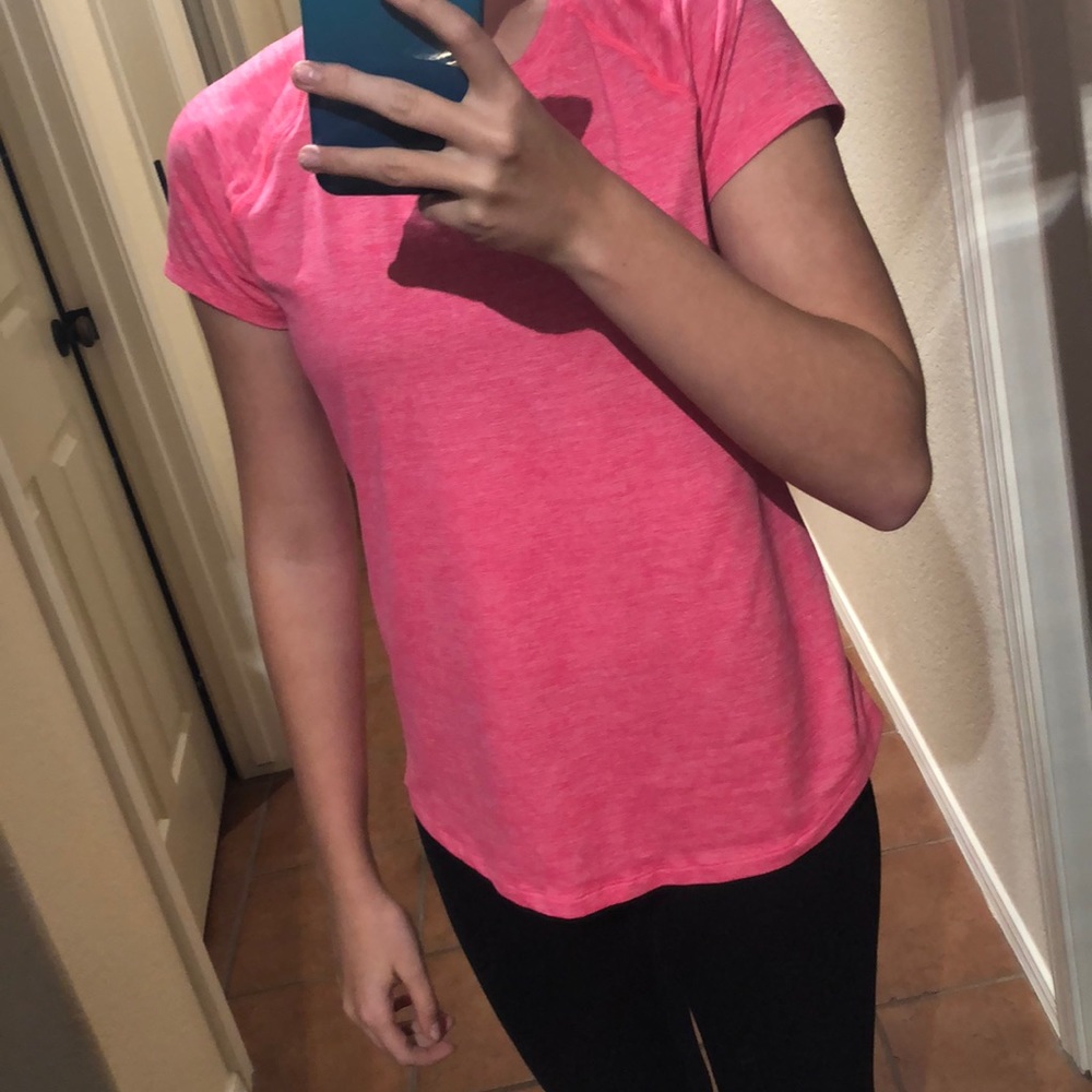 Pink short sleeve shirt.
